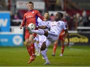 3 March 2023; Jonathan Afolabi of Bohemians in action against Jonathan Lunney of Shelbourne during the SSE Airtricity Men's Premier Division match between Shelbourne and Bohemians at Tolka Park in Dublin. Photo by Tyler Miller/Sportsfile