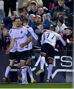 3 March 2023; Rayhaan Tulloch of Dundalk, right, celebrates with supporters after scoring their side's third goal during the SSE Airtricity Men's Premier Division match between Dundalk and St Patrick's Athletic at Oriel Park in Dundalk, Louth. Photo by Ben McShane/Sportsfile