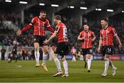 3 March 2023; Jamie McGonigle of Derry City, centre, celebrates with teammate Ryan Graydon, left, after scoring their side's during the SSE Airtricity Men's Premier Division match between Shamrock Rovers and Derry City at Tallaght Stadium in Dublin. Photo by Seb Daly/Sportsfile