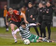 3 March 2023; Trevor Clarke of Shamrock Rovers in action against Mark Connolly of Derry City during the SSE Airtricity Men's Premier Division match between Shamrock Rovers and Derry City at Tallaght Stadium in Dublin. Photo by Stephen McCarthy/Sportsfile