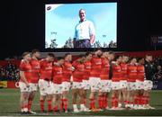 3 March 2023; The Munster team stand for a minute's silence in memory of the late former Munster and Ireland player, and former Ireland womens head coach, Tom Tierney before the United Rugby Championship match between Munster and Scarlets at Musgrave Park in Cork. Photo by Michael P Ryan/Sportsfile