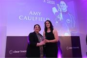 3 March 2023; Carrie Archer from Cricket ireland presents the Turkish Airlines Women's Club Player of the Year Award to Amy Caulfield during the 2023 Irish Cricket Awards at The Marker Hotel in Dublin. Photo by Matt Browne/Sportsfile