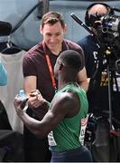 4 March 2023; Israel Olatunde of Ireland is congratulated by RTÉ's David Gillick after qualifying for the men's 60m semi-final during Day 2 of the European Indoor Athletics Championships at Ataköy Athletics Arena in Istanbul, Türkiye. Photo by Sam Barnes/Sportsfile