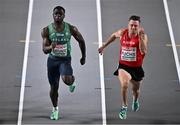 4 March 2023; Israel Olatunde of Ireland, left, and Markus Fuchs of Austria competes in the men's 60m heats during Day 2 of the European Indoor Athletics Championships at Ataköy Athletics Arena in Istanbul, Türkiye. Photo by Sam Barnes/Sportsfile