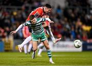 3 March 2023; Jordan McEneff of Derry City is tackled by Sean Gannon of Shamrock Rovers during the SSE Airtricity Men's Premier Division match between Shamrock Rovers and Derry City at Tallaght Stadium in Dublin. Photo by Seb Daly/Sportsfile
