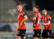 3 March 2023; Derry City players, from left, Mark Connolly, Patrick McEleney and Ciarán Coll during the SSE Airtricity Men's Premier Division match between Shamrock Rovers and Derry City at Tallaght Stadium in Dublin. Photo by Seb Daly/Sportsfile