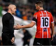 3 March 2023; Assistant referee Allen Lynch talks to Shane McEleney of Derry City during the SSE Airtricity Men's Premier Division match between Shamrock Rovers and Derry City at Tallaght Stadium in Dublin. Photo by Seb Daly/Sportsfile