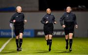 3 March 2023; Match officials, from left, Allen Lynch, Neil Doyle and Emmett Dynan warm-up before the SSE Airtricity Men's Premier Division match between Shamrock Rovers and Derry City at Tallaght Stadium in Dublin. Photo by Seb Daly/Sportsfile