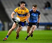 25 February 2023; Jamie Malone of Clare in action against Daire Newcombe of Dublin during the Allianz Football League Division 2 match between Dublin and Clare at Croke Park in Dublin. Photo by Piaras Ó Mídheach/Sportsfile