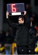 3 March 2023; Fourth official Rob Harvey holds up the board showing an additional six minutes of injury time during the SSE Airtricity Men's Premier Division match between Shamrock Rovers and Derry City at Tallaght Stadium in Dublin. Photo by Stephen McCarthy/Sportsfile