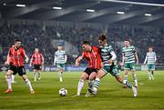 3 March 2023; Patrick McEleney of Derry City in action against Johnny Kenny of Shamrock Rovers during the SSE Airtricity Men's Premier Division match between Shamrock Rovers and Derry City at Tallaght Stadium in Dublin. Photo by Stephen McCarthy/Sportsfile