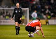 3 March 2023; Referee Neil Doyle with Will Patching of Derry City during the SSE Airtricity Men's Premier Division match between Shamrock Rovers and Derry City at Tallaght Stadium in Dublin. Photo by Stephen McCarthy/Sportsfile