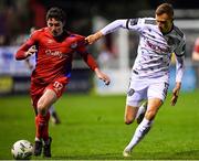 3 March 2023; Kian Leavy of Shelbourne in action against Kacper Radkowski of Bohemians during the SSE Airtricity Men's Premier Division match between Shelbourne and Bohemians at Tolka Park in Dublin. Photo by Tyler Miller/Sportsfile