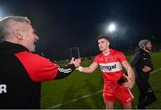 4 March 2023; Derry manager Rory Gallagher and Conor Doherty of Derry celebrate after the Allianz Football League Division 2 match between Derry and Dublin at Celtic Park in Derry. Photo by Ramsey Cardy/Sportsfile