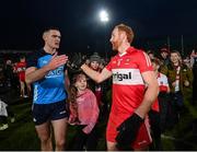 4 March 2023; Brian Fenton of Dublin and Conor Glass of Derry after the Allianz Football League Division 2 match between Derry and Dublin at Celtic Park in Derry. Photo by Ramsey Cardy/Sportsfile