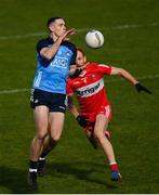 4 March 2023; Brian Fenton of Dublin in action against Conor Glass of Derry during the Allianz Football League Division 2 match between Derry and Dublin at Celtic Park in Derry. Photo by Ramsey Cardy/Sportsfile