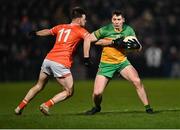 4 March 2023; Jamie Brennan of Donegal in action against Callum Cumiskey of Armagh during the Allianz Football League Division 1 match between Armagh and Donegal at Box-It Athletic Grounds in Armagh. Photo by Piaras Ó Mídheach/Sportsfile