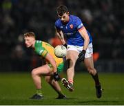 4 March 2023; Armagh goalkeeper Ethan Rafferty makes his way past Oisín Gallen of Donegal during the Allianz Football League Division 1 match between Armagh and Donegal at Box-It Athletic Grounds in Armagh. Photo by Piaras Ó Mídheach/Sportsfile
