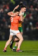 4 March 2023; Jason McGee of Donegal in action against Aidan Forker of Armagh during the Allianz Football League Division 1 match between Armagh and Donegal at Box-It Athletic Grounds in Armagh. Photo by Piaras Ó Mídheach/Sportsfile