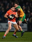4 March 2023; Niall Grimley of Armagh in action against Hugh McFadden of Donegal during the Allianz Football League Division 1 match between Armagh and Donegal at Box-It Athletic Grounds in Armagh. Photo by Piaras Ó Mídheach/Sportsfile