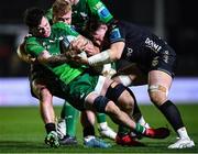 4 March 2023; Conor Oliver of Connacht is tackled by Taine Basham, right, and Bradley Roberts of Dragons during the United Rugby Championship match between Dragons and Connacht at Rodney Parade in Newport, Wales. Photo by Ben Evans/Sportsfile