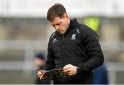 5 March 2023; Conor McManus of Monaghan reads the match day programme before the Allianz Football League Division 1 match between Galway and Monaghan at Pearse Stadium in Galway. Photo by Seb Daly/Sportsfile