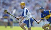 6 June 2004; Eoin Murphy, Waterford, in action against Seamus Butler, Tipperary. Guinness Munster Senior Hurling Championship semi-final, Tipperary v Waterford, Pairc Ui Chaoimh, Cork. Picture credit; Brendan Moran / SPORTSFILE