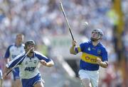 6 June 2004; Eoin Kelly, Tipperary, in action against James Murray, Waterford. Guinness Munster Senior Hurling Championship semi-final, Tipperary v Waterford, Pairc Ui Chaoimh, Cork. Picture credit; Brendan Moran / SPORTSFILE