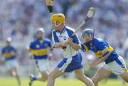 6 June 2004; Eoin Murphy, Waterford, in action against Seamus Butler, Tipperary. Guinness Munster Senior Hurling Championship semi-final, Tipperary v Waterford, Pairc Ui Chaoimh, Cork. Picture credit; Brendan Moran / SPORTSFILE