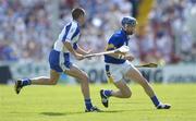 6 June 2004; Benny Dunne, Tipperary, in action against Brian Phelan, Waterford. Guinness Munster Senior Hurling Championship semi-final, Tipperary v Waterford, Pairc Ui Chaoimh, Cork. Picture credit; Brendan Moran / SPORTSFILE