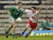 6 June 2004; Peter Sherry, Fermanagh, in action against Mark Harte, Tyrone. Bank of Ireland Ulster Senior Football Championship, Tyrone v Fermanagh, St. Tighernach's Park, Clones, Co. Monaghan. Picture credit; Damien Eagers / SPORTSFILE