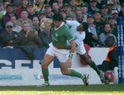12 June 2004; Shane Horgan, Ireland, goes over for his try despite the tackle of Breyton Taulse, South Africa. South Africa Tour June 2004, South Africa v Ireland, Vodacompark, Bloemfontein, Free State, South Africa. Picture credit; Matt Browne / SPORTSFILE