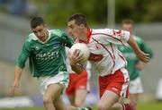 6 June 2004; Brian McGuigan, Tyrone, in action against Fermanagh. Bank of Ireland Ulster Senior Football Championship, Tyrone v Fermanagh, St. Tighernach's Park, Clones, Co. Monaghan. Picture credit; Damien Eagers / SPORTSFILE
