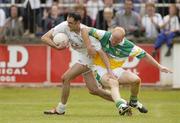 12 June 2004; Dermot Earley, Kildare, in action against Conor Evans, Offaly. Bank of Ireland Football Championship Qualifier, Round 1, Kildare v Offaly, St. Conleth's Park, Newbridge, Co. Kildare. Picture credit; Brendan Moran / SPORTSFILE