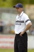 12 June 2004; Kildare manager Padraig Nolan watches the final moments of his sides defeat to Offaly. Bank of Ireland Football Championship Qualifier, Round 1, Kildare v Offaly, St. Conleth's Park, Newbridge, Co. Kildare. Picture credit; Brendan Moran / SPORTSFILE