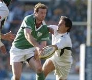 12 June 2004; Geordan Murphy, Ireland, is tackled by Gaffie Du Toit, South Africa. South Africa Tour June 2004, South Africa v Ireland, Vodacompark, Bloemfontein, Free State, South Africa. Picture credit; Matt Browne / SPORTSFILE