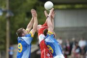 12 June 2004; Gary Doran, left, and Brendan O hAnnaidh, Wicklow, in action against Pascal Bradley, Derry. Bank of Ireland Football Championship Qualifier, Round 1, Wicklow v Derry, County Grounds, Aughrim, Co. Wicklow. Picture credit; David Maher / SPORTSFILE
