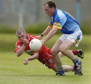 12 June 2004; Francis McEldowney, Derry, in action against Brendan OhAnnaidh, Wicklow. Bank of Ireland Football Championship Qualifier, Round 1, Wicklow v Derry, County Grounds, Aughrim, Co. Wicklow. Picture credit; David Maher / SPORTSFILE
