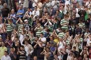12 June 2004; Shamrock Rovers supporters celebrate victory over Bohemians. eircom league, Premier Division, Shamrock Rovers v Bohemians, Dalymount Park, Dublin. Picture credit; Pat Murphy / SPORTSFILE