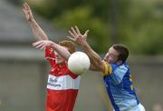 12 June 2004; Gary Doran, Wicklow, in action against Fergal Doherty, Derry. Bank of Ireland Football Championship Qualifier, Round 1, Wicklow v Derry, County Grounds, Aughrim, Co. Wicklow. Picture credit; David Maher / SPORTSFILE