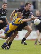 12 June 2004; Ger Quinlan, Clare, in action against Dara McGarty, Sligo. Bank of Ireland Football Championship Qualifier, Round 1, Clare v Sligo, Cusack Park, Ennis, Co. Clare. Picture credit; SPORTSFILE