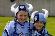 12 June 2004; Dublin fans Neil Power, 10 years, and Conor Power, 7 years, both from Kilbarrack, Dublin, at the game. Bank of Ireland Football Championship Qualifier, Round 1, Dublin v London, Parnell Park, Dublin. Picture credit; Ray McManus / SPORTSFILE