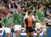 12 June 2004; Ireland's John Hayes and Paul O'Connell leave the field after defeat to South Africa. South Africa Tour June 2004, South Africa v Ireland, Vodacompark, Bloemfontein, Free State, South Africa. Picture credit; Matt Browne / SPORTSFILE