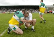 12 June 2004; Offaly's Ciaran McManus, left, consoles Kildare's Glenn Ryan after the final whiste. Bank of Ireland Football Championship Qualifier, Round 1, Kildare v Offaly, St. Conleth's Park, Newbridge, Co. Kildare. Picture credit; Brendan Moran / SPORTSFILE