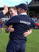 12 June 2004; John Kennedy, Clare manager, celebrates with one of his players after victory over Sligo. Bank of Ireland Football Championship Qualifier, Round 1, Clare v Sligo, Cusack Park, Ennis, Co. Clare. Picture credit; SPORTSFILE