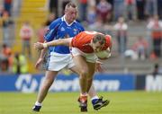13 June 2004; Paddy McKeever, Armagh, in action against Rory Donohue, Cavan. Bank of Ireland Ulster Senior Football Championship Semi-Final, Cavan v Armagh, St. Tighernach's Park, Clones, Co. Monaghan. Picture credit; Damien Eagers /  SPORTSFILE