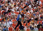 13 June 2004; Cavan manager Eamonn Coleman walks past Armagh supporters during the match. Bank of Ireland Ulster Senior Football Championship Semi-Final, Cavan v Armagh, St. Tighernach's Park, Clones, Co. Monaghan. Picture credit; Damien Eagers / SPORTSFILE