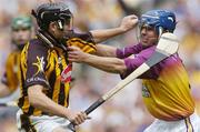 13 June 2004; Eddie Brennan, Kilkenny, in action against Malachy Travers, Wexford. Guinness Leinster Senior Hurling Championship Semi-Final, Kilkenny v Wexford, Croke Park, Dublin. Picture credit; Brian Lawless / SPORTSFILE