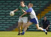 13 June 2004; Maurice Horan, Limerick, is tackled by Trevor Costelloe, Waterford. Bank of Ireland Munster Senior Football Championship Semi-Final, Limerick v Waterford, Gaelic Grounds, Limerick. Picture credit; Pat Murphy / SPORTSFILE