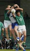 13 June 2004; Limerick's Mike O'Brien assisted by team-mate John Quane, left, wins possession against Michael Ahern, Waterford. Bank of Ireland Munster Senior Football Championship Semi-Final, Limerick v Waterford, Gaelic Grounds, Limerick. Picture credit; Pat Murphy / SPORTSFILE